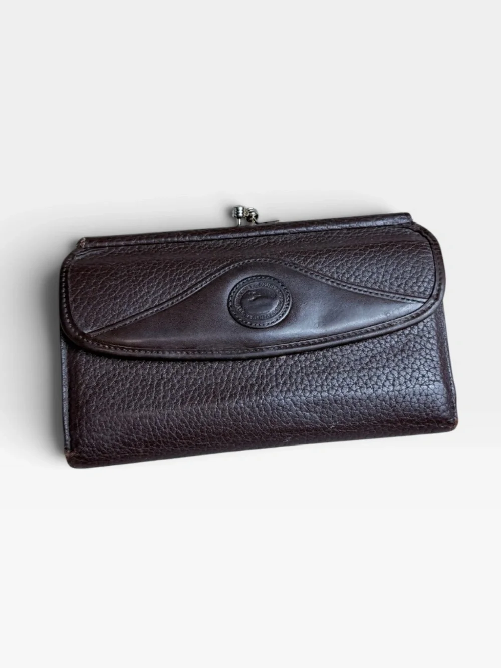 Dooney & Bourke All-Weather Leather kiss-lock Wallet Pebbled Leather Brown